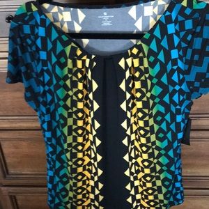 Pretty multi colored top. Short sleeves . Nice for work or going out .